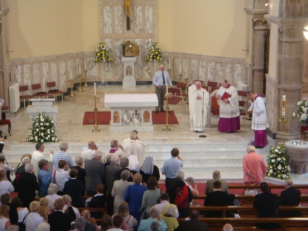 Fr Len imparts his first blessing